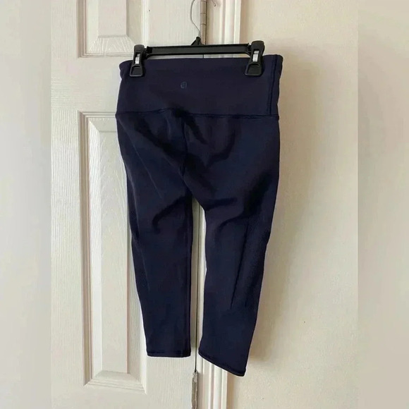 Lululemon set of cropped leggings with mesh on side 
Sz small navy blue & black - Picture 14 of 16